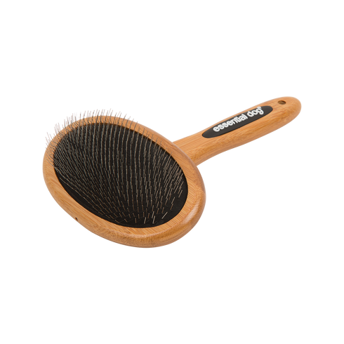 The Bamboo Slicker brush with sustainable bamboo handle and stainless steel pins